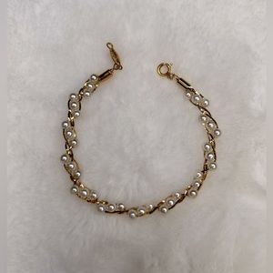 Napier faux pearl gold tone twist bracelet